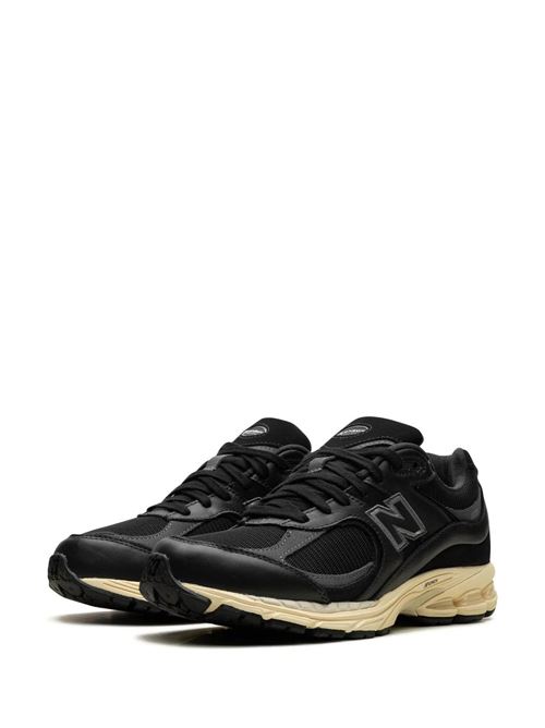 Black/white leather mesh sneaker New Balance | M2002RIBBLACK